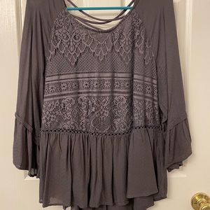 Peplum top with lace detail